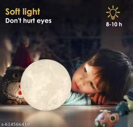 Color changing 3D moon lamp glowing on bedside table
